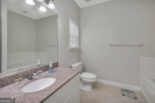 full bathroom with tile patterned flooring, visible vents, baseboards, toilet, and a garden tub