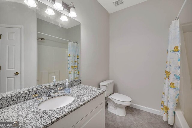 full bathroom featuring visible vents, curtained shower, toilet, tile patterned floors, and vanity