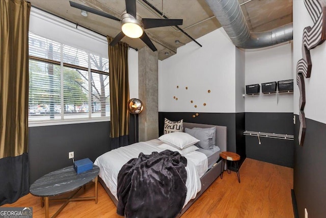 bedroom featuring wood finished floors