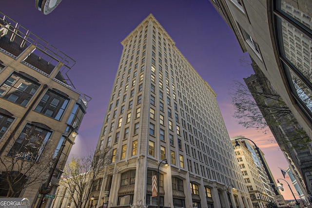 view of property at dusk