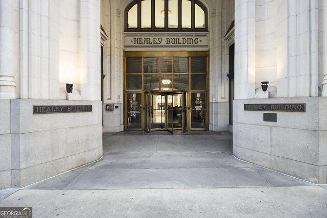 entrance to property featuring french doors