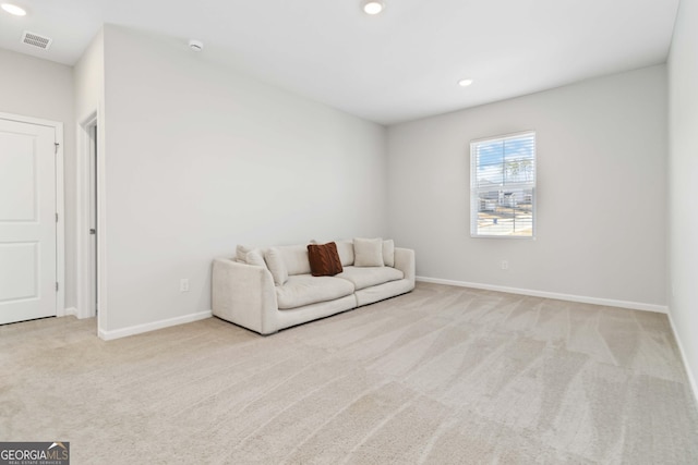 unfurnished room with carpet flooring, recessed lighting, visible vents, and baseboards