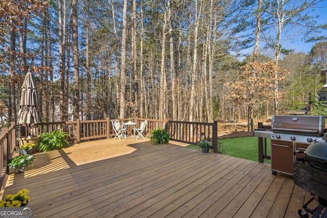 wooden deck featuring grilling area