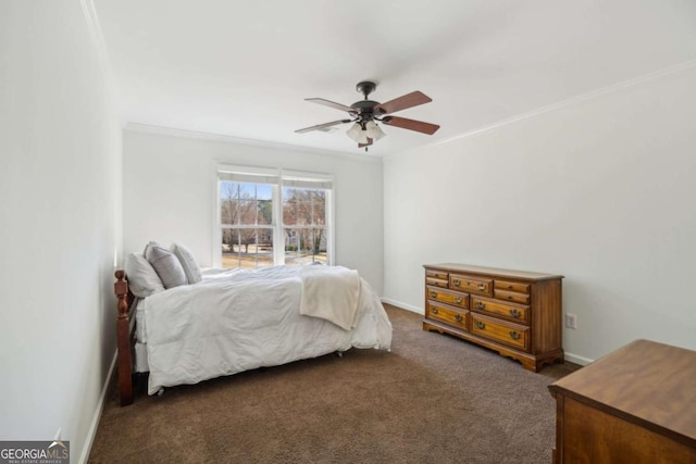 bedroom featuring baseboards, a ceiling fan, carpet flooring, and crown molding