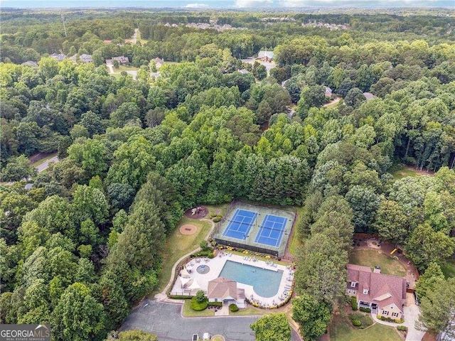 aerial view featuring a forest view