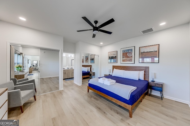 bedroom with recessed lighting, visible vents, and light wood finished floors