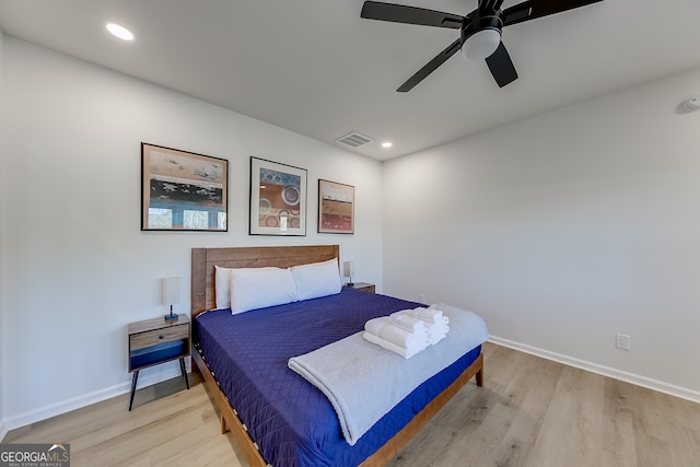 bedroom featuring baseboards, recessed lighting, visible vents, and light wood-type flooring