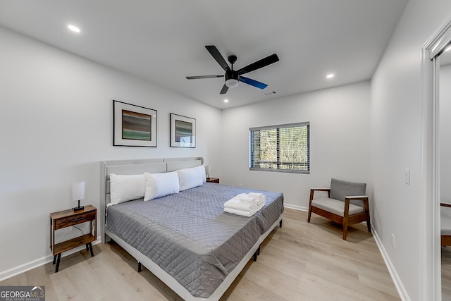 bedroom featuring visible vents, recessed lighting, light wood finished floors, baseboards, and ceiling fan