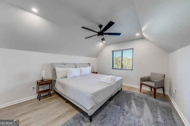 bedroom with baseboards, lofted ceiling, recessed lighting, light wood-style floors, and a ceiling fan