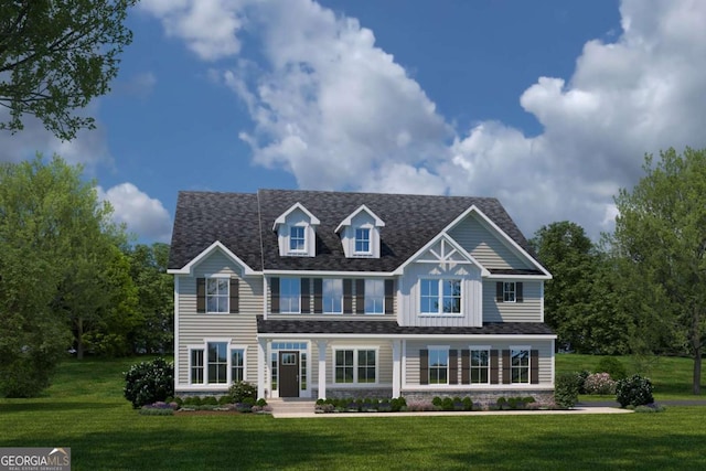 view of front of home with a front lawn and roof with shingles