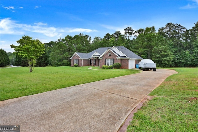 ranch-style home with brick siding, a garage, driveway, and a front lawn