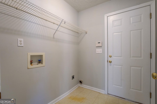 laundry area with washer hookup, a textured ceiling, baseboards, hookup for an electric dryer, and laundry area