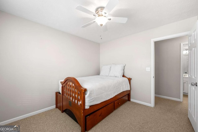 bedroom featuring carpet, baseboards, and ceiling fan