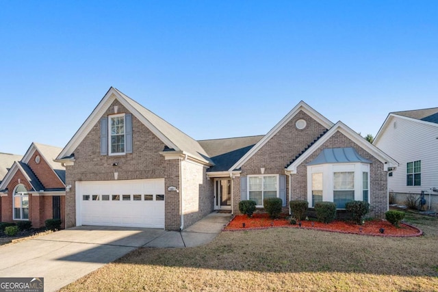 view of front of property with brick siding, a garage, concrete driveway, and a front yard