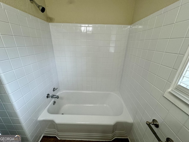 full bath featuring shower / tub combination