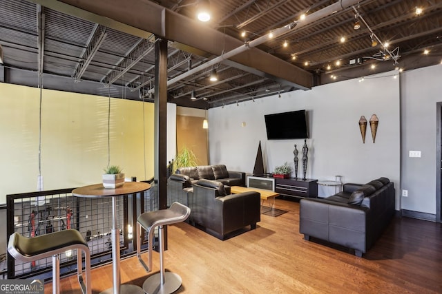 living area featuring wood finished floors