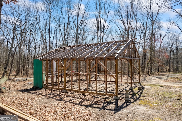 view of community with an outdoor structure