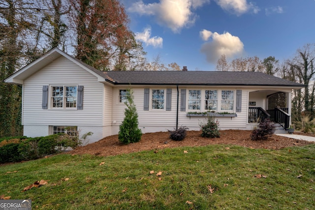 ranch-style house with a front yard