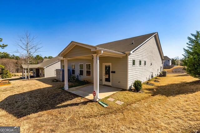 back of house featuring a patio