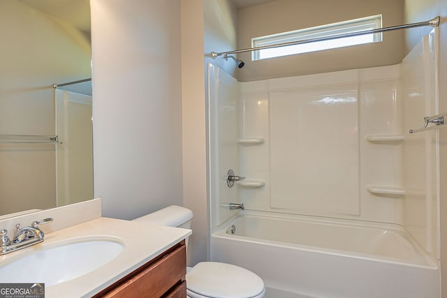 full bathroom featuring toilet, shower / washtub combination, and vanity