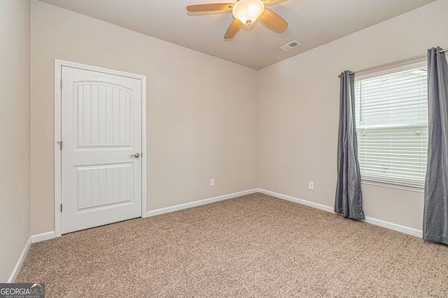 4 October Ave, Newnan, GA 30265 - carpeted empty room with ceiling fan and baseboards