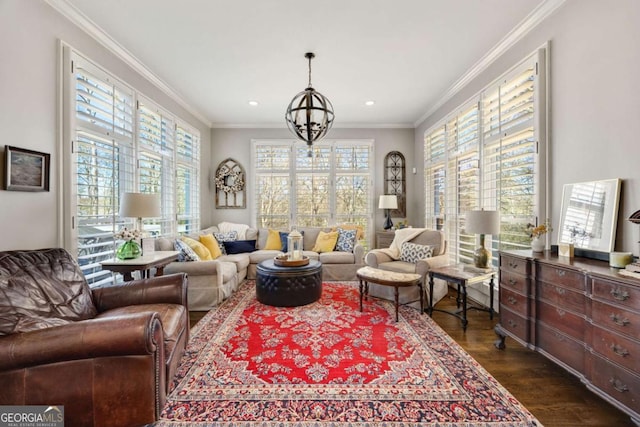 living area with a notable chandelier, recessed lighting, crown molding, and dark wood-type flooring