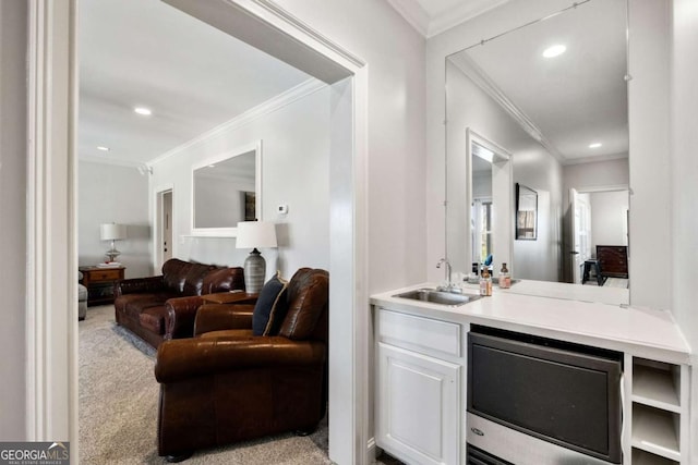 interior space with vanity, crown molding, and recessed lighting