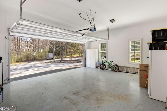 garage featuring freestanding refrigerator