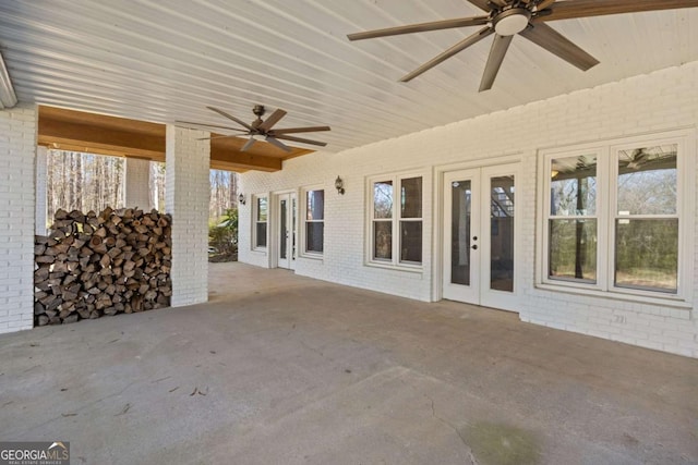 view of patio with french doors and ceiling fan