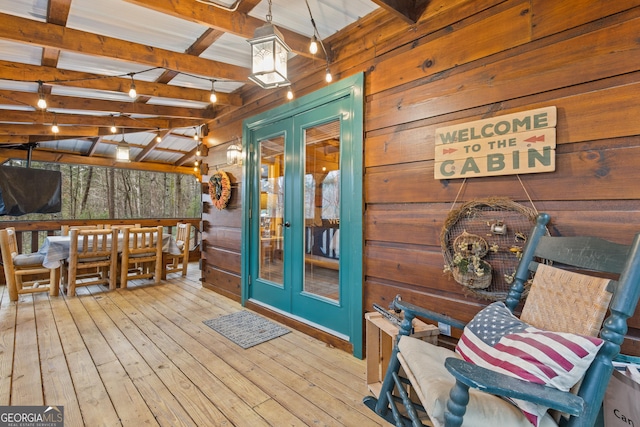 wooden deck featuring french doors