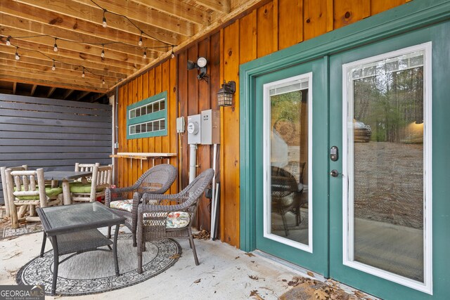 view of patio with french doors and outdoor dining area