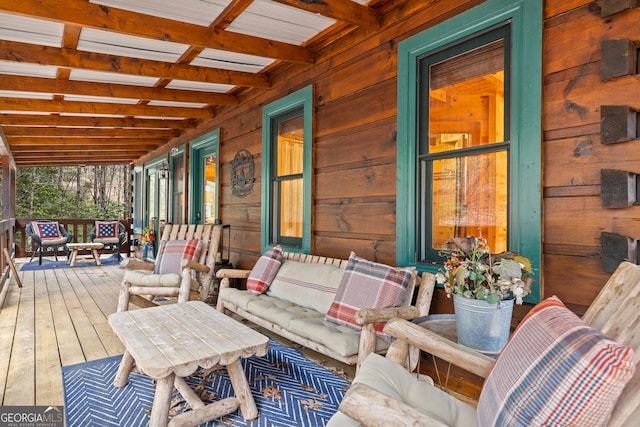 deck with an outdoor hangout area