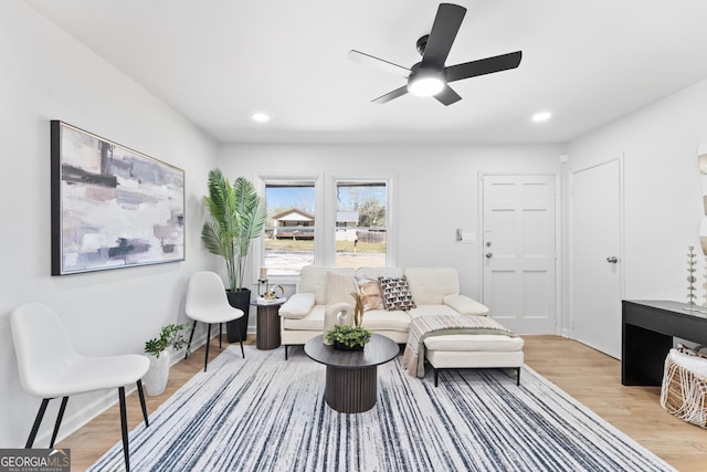 sitting room featuring recessed lighting, baseboards, light wood-type flooring, and ceiling fan