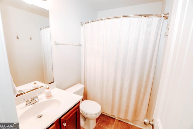 full bath with vanity, tile patterned floors, toilet, and a shower with curtain