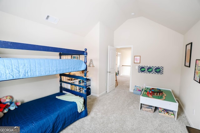 bedroom with vaulted ceiling, baseboards, visible vents, and carpet floors