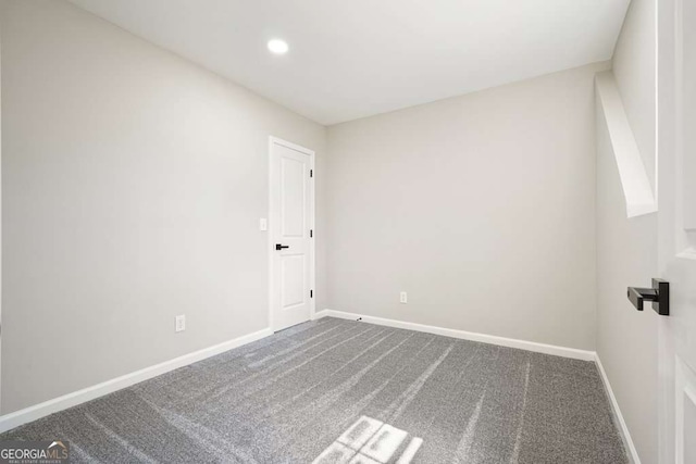 unfurnished room with recessed lighting, baseboards, and carpet floors