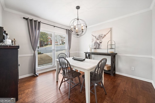 dining space with crown molding, wood finished floors, and baseboards