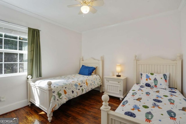 bedroom with baseboards, ceiling fan, dark wood-style flooring, and crown molding