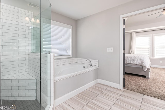 ensuite bathroom featuring visible vents, a stall shower, ensuite bath, and a garden tub