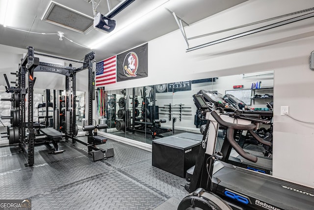 gym featuring a garage