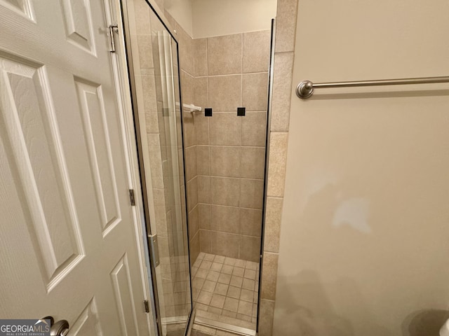 full bathroom featuring a shower stall