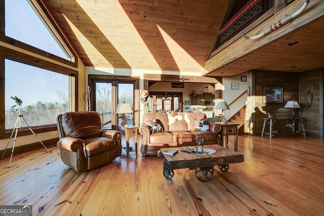 living room featuring wood ceiling, stairway, wood finished floors, and high vaulted ceiling