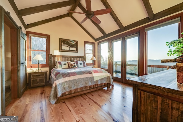 bedroom with beam ceiling, access to outside, french doors, and light wood finished floors