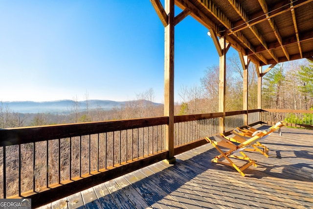 wooden terrace with a mountain view