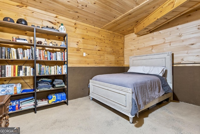 bedroom featuring wooden walls and wood ceiling