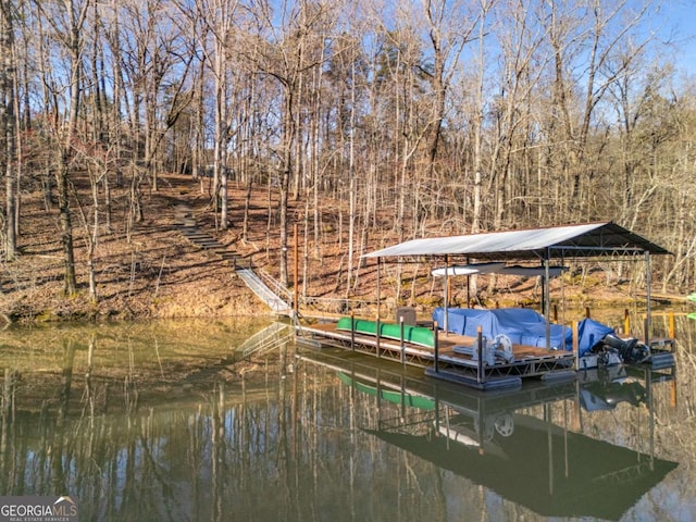 view of dock with a water view