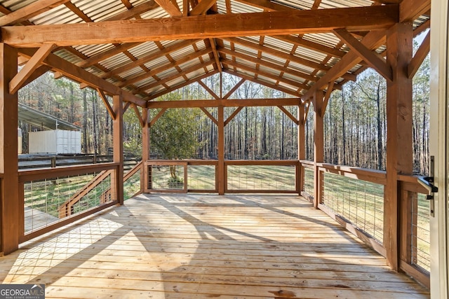 wooden terrace with a forest view