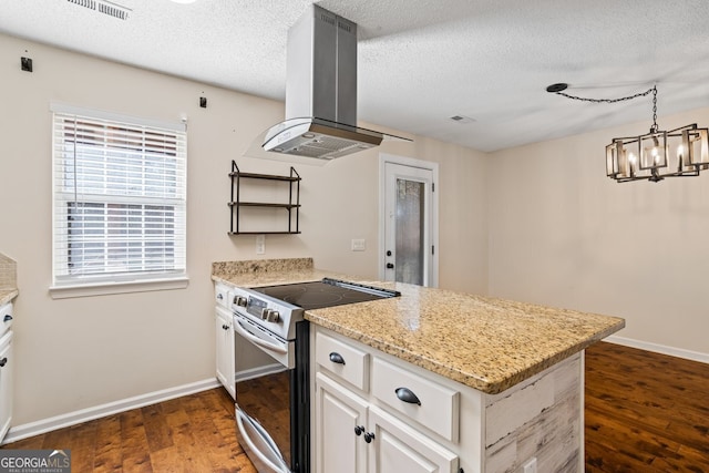 kitchen with a peninsula, exhaust hood, electric stove, and dark wood-type flooring