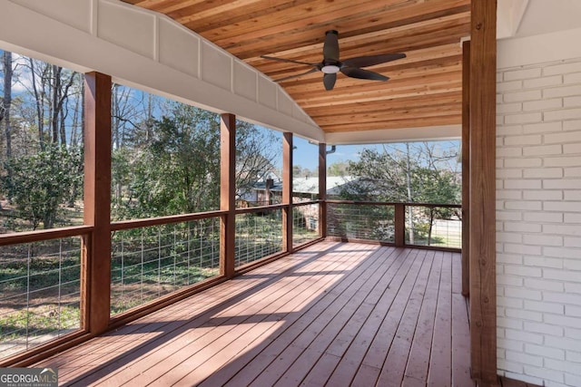 wooden deck with ceiling fan