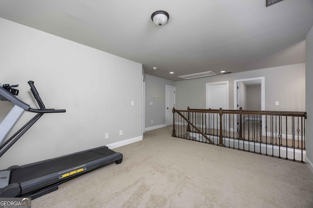 workout area featuring recessed lighting, carpet, and baseboards